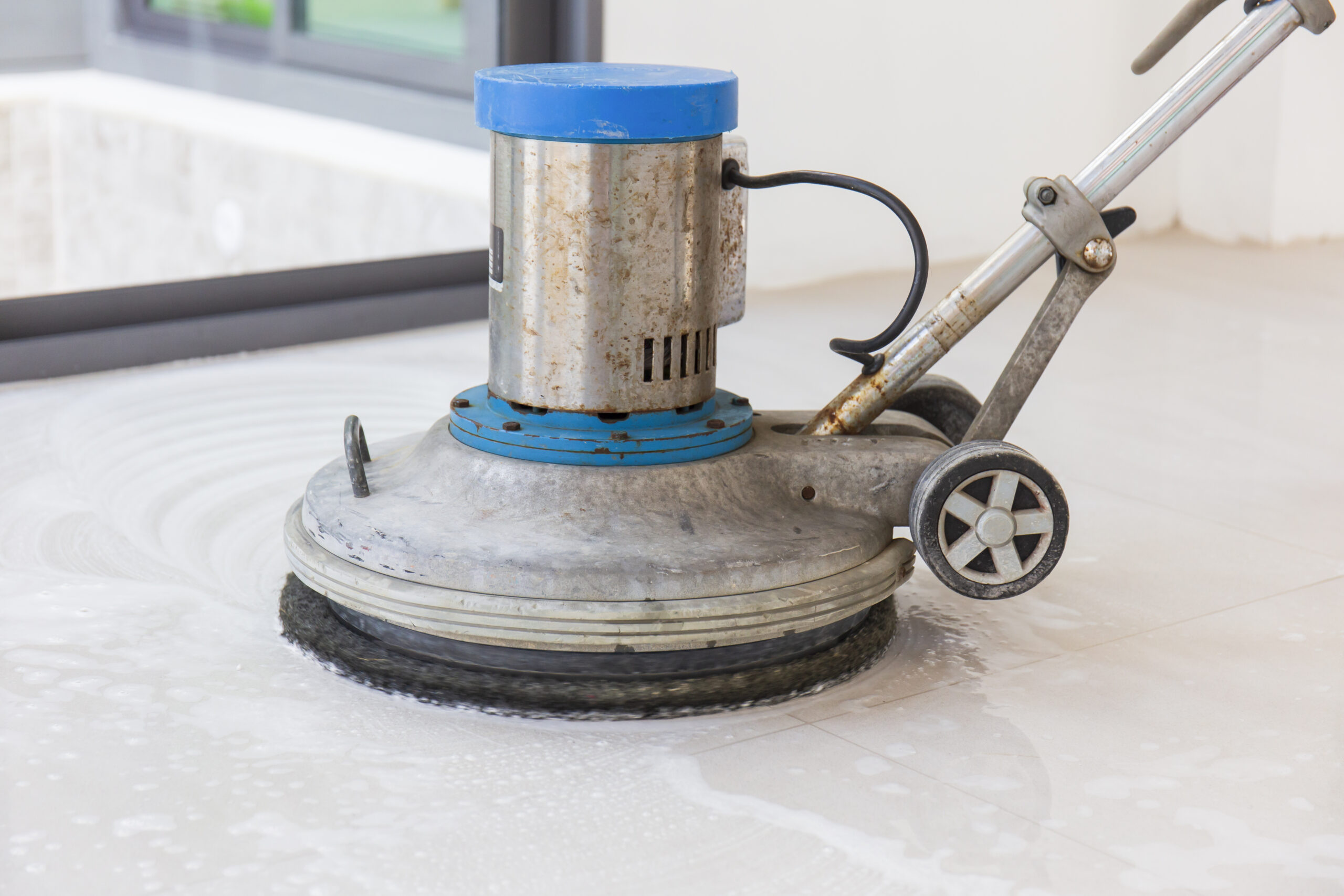 Machine for scrubbing floors to clean.